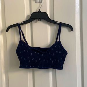 Dark blue with light blue markings. Super crop